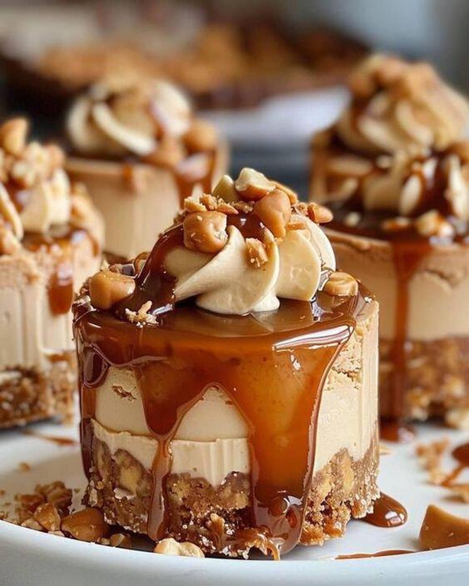Mini Caramel Peanut Cheesecakes