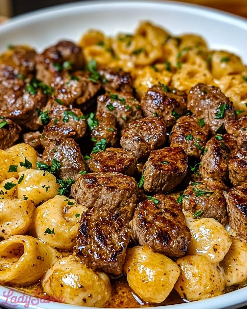 Cajun Steak Bites and Cheesy Garlic Shells Skillet